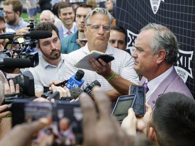 TCU head coach Sonny Dykes listens to questions from reporters during the Big 12 Media Days...