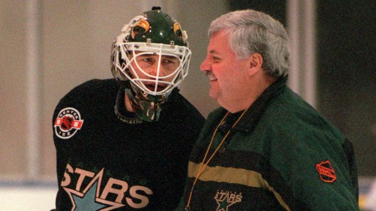 FILE — Dallas Stars goalie Ed Belfour (left) talks with Head Coach Ken Hitchcock (right), as...