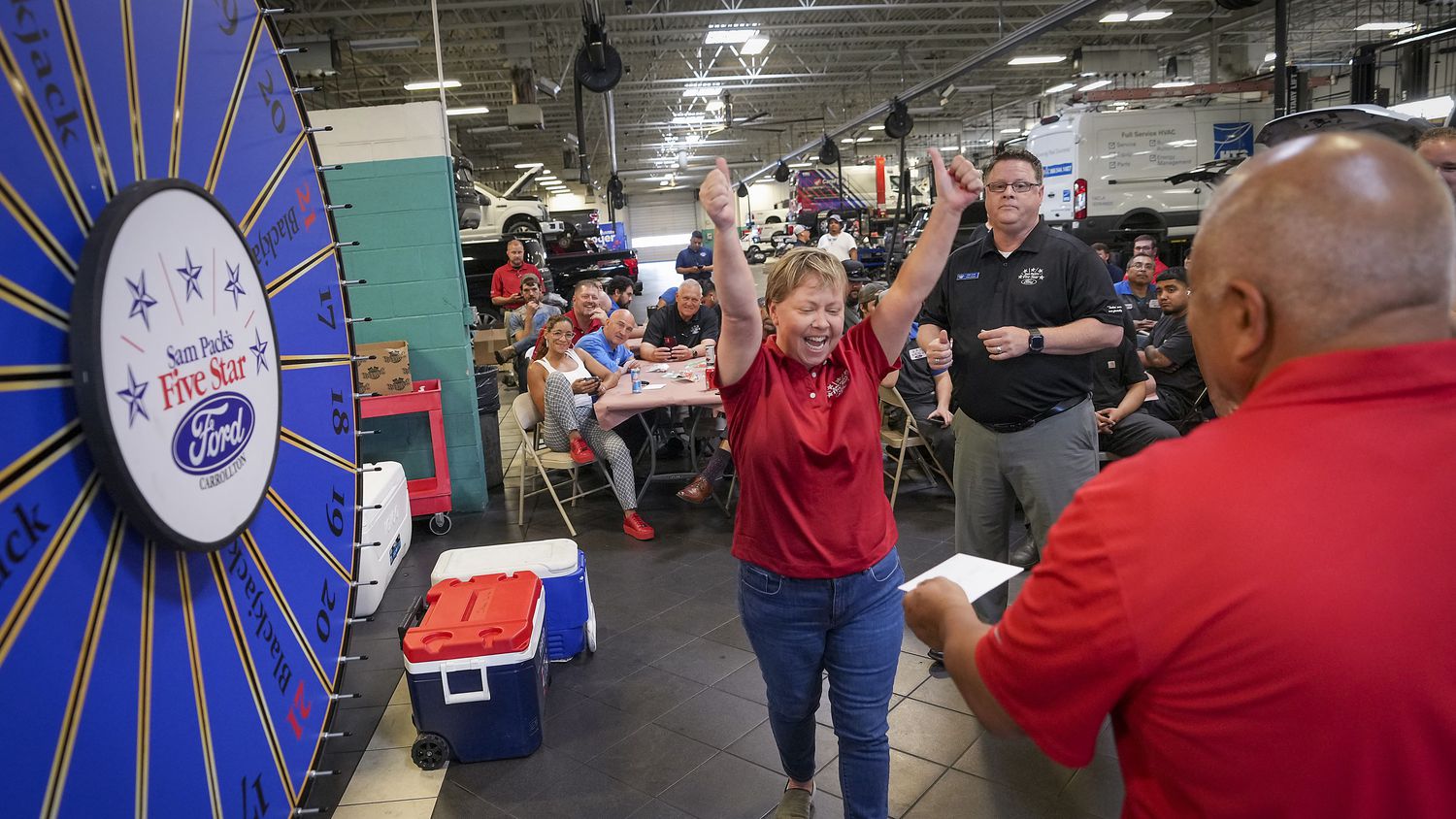 Sam Pack's Five Star Ford in Carrollton was one of 2022's midsize company award winners in...