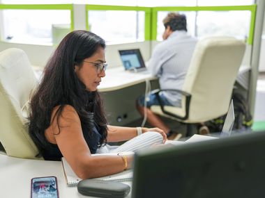 Veepsa Bhatia participates in a video conference at the Copper Mobile offices on Sept. 23 in...
